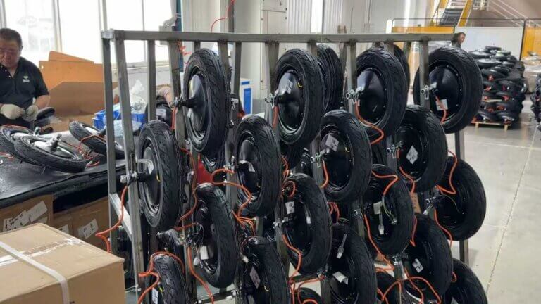 Jimsen e-bike wheel component assembly during production